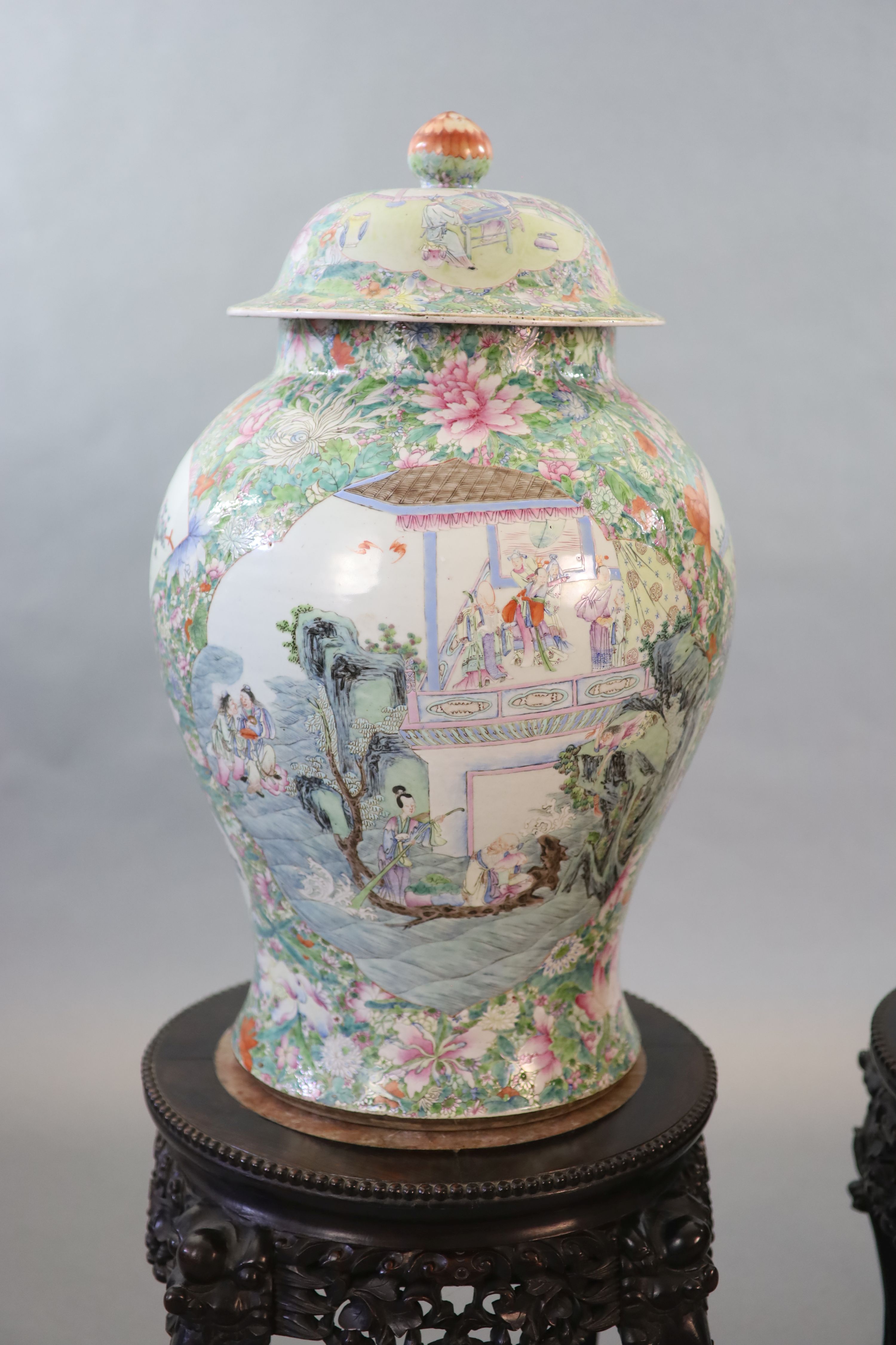 An impressive pair of Chinese famille rose ‘eight immortals’ vases and covers, late 19th century, Total height 113.5 cm including stands